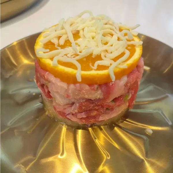Ternera con piña y aroma de naranja